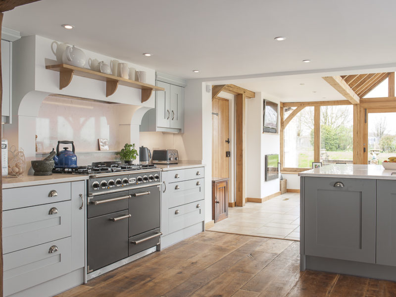 farmhouse kitchen with wood floor and range cooker
