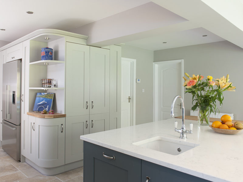 sophisicated grey kitchen with flowers