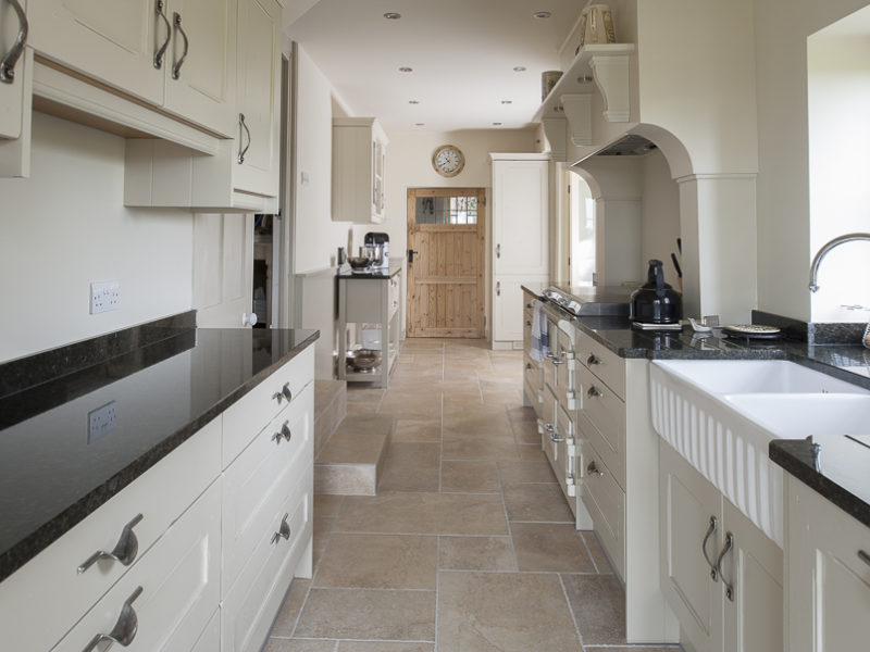 classic galley kitchen with tiled floor