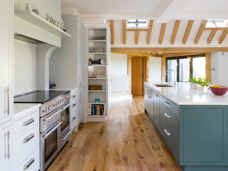 modern country kitchen with wood floor and range cooker