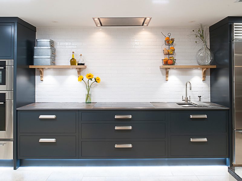 minimal dark grey kitchen with chrome details