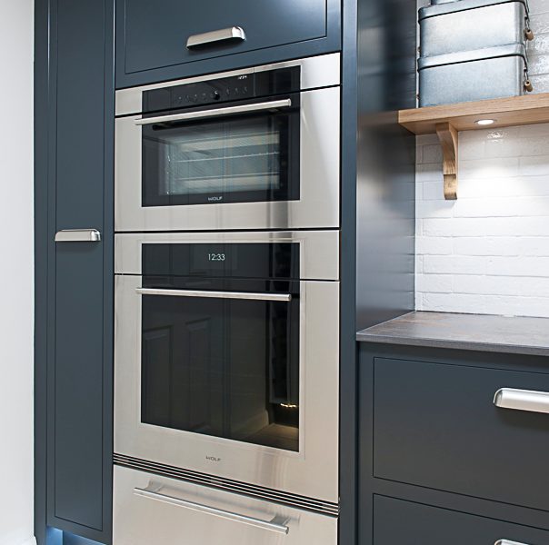 dark grey minimal kitchen with oven