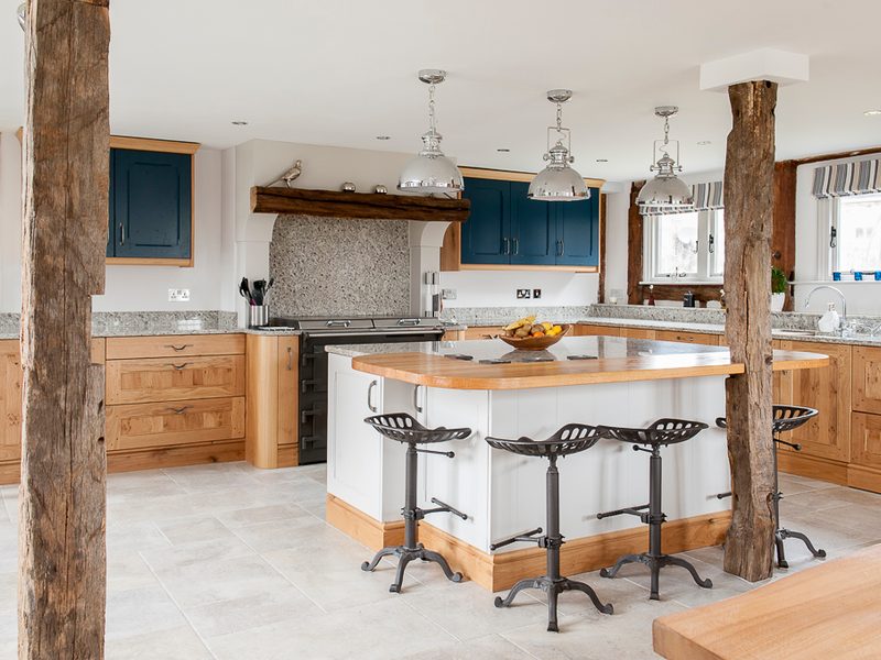 kitchen with beams and industrial barstools