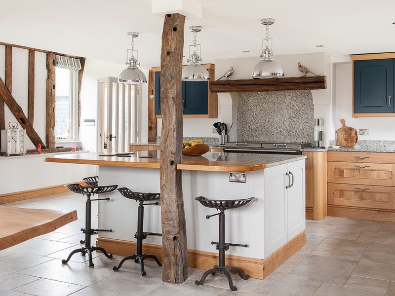 kitchen with beams and tiled floor