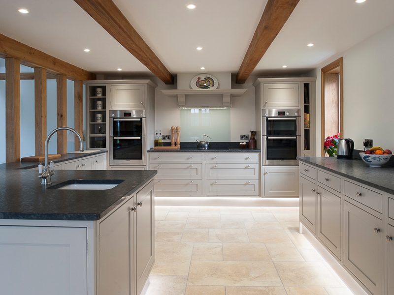 kitchen with beams and dark worktops