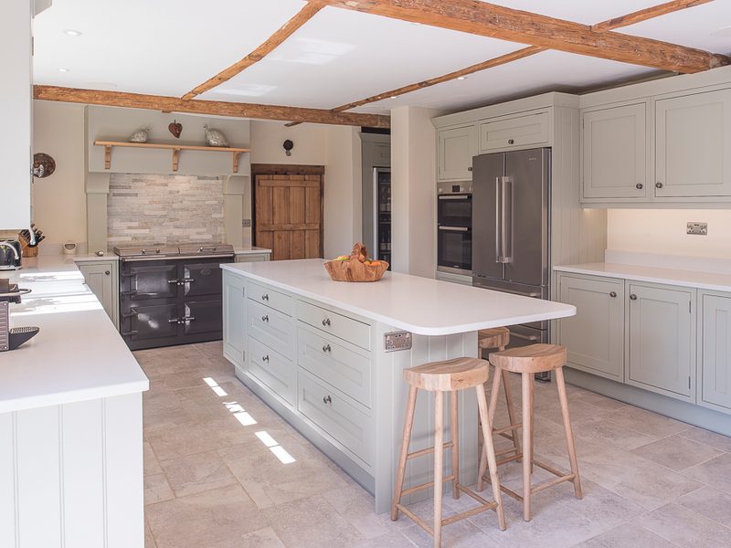 functional kitchen with tiled floor and island