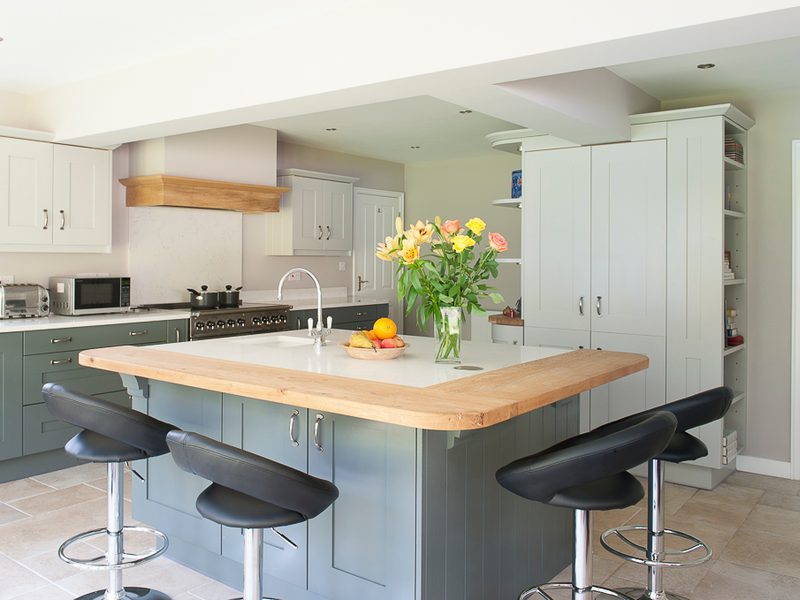 grey kitchen island with breakfast bar