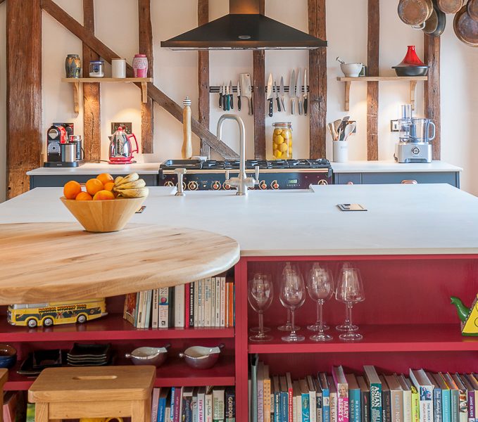barn kitchen with pendant lights and barstool