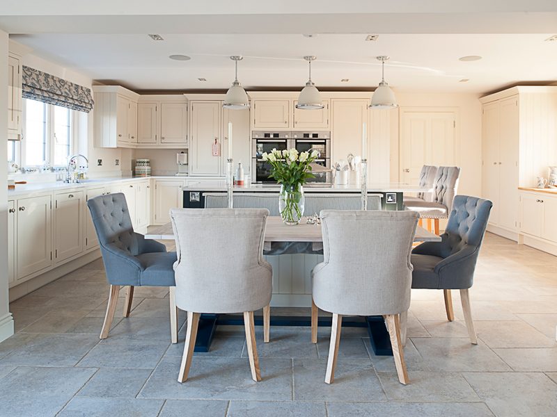 classic kitchen with dining area and tiled floor
