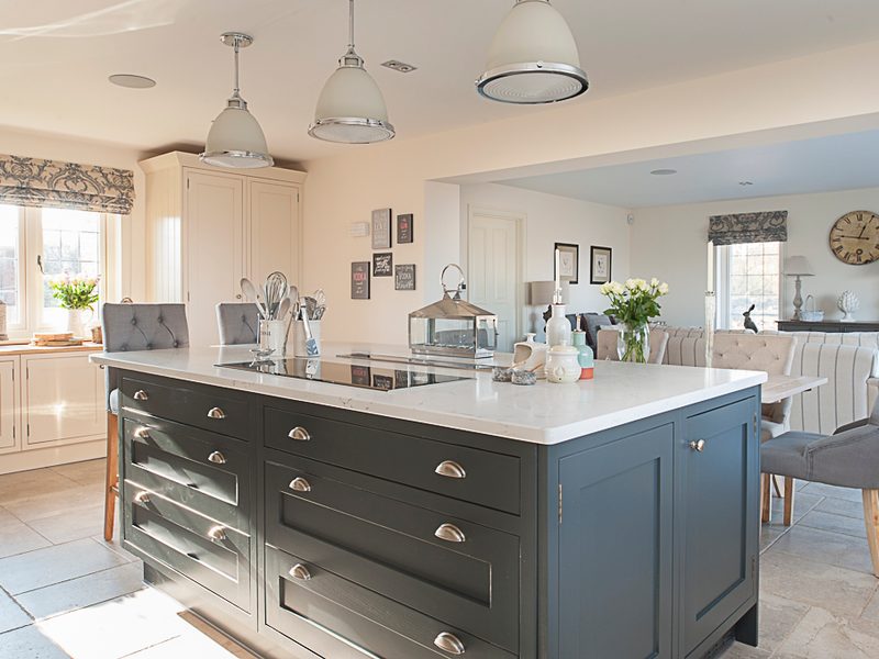 classic kitchen with island and pendant lights