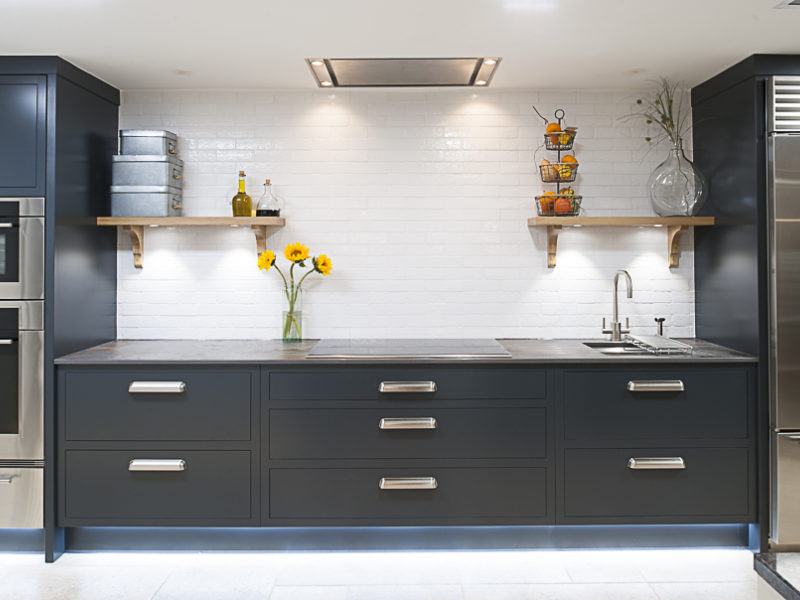 minimal dark grey kitchen with chrome details